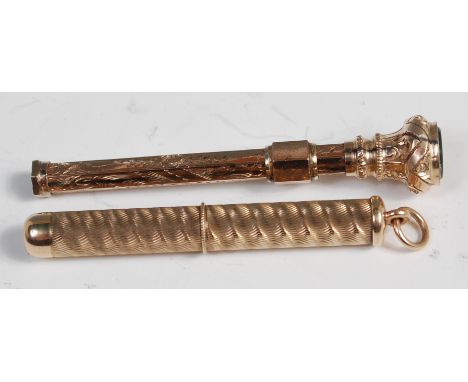 A 9ct gold propelling toothpick, with engine turned decoration; and one other hexagonal bloodstone set example (2) 