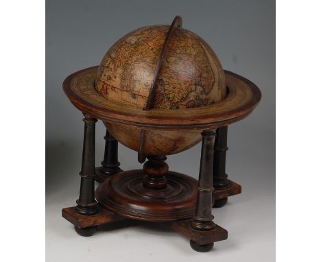 After Guilielmus Nicolai - Terrestrial table globe, bearing the date 1603, raised on a turned walnut stand, h.29cm, globe dia