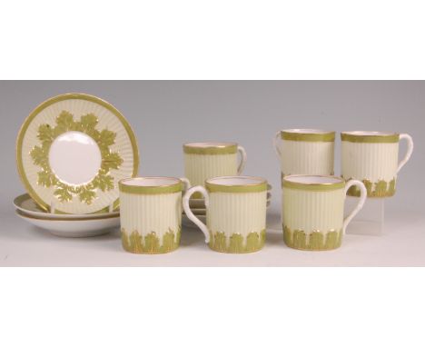 A set of six Russian porcelain coffee cans and saucers, Gardner Factory, late 19th century, each leaf moulded and heightened 