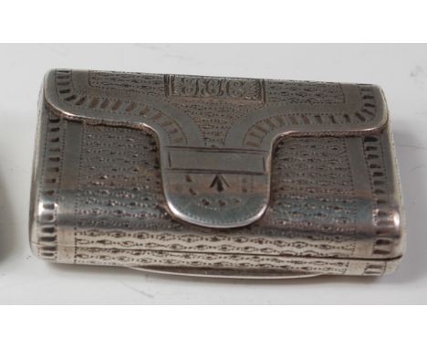 A late Georgian silver pocket snuff box, disguised as a satchel, having engine turned decoration and gilt washed interior, ma