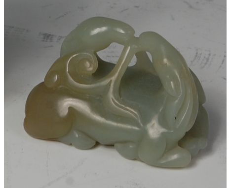 A 19th century Chinese carved and polished celadon jade figure of a pair of entwined recumbent horses, w.5.5cm Condition Repo