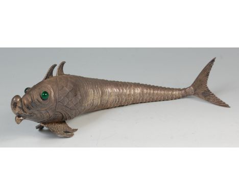A Japanese articulated white metal fish, with naturalistically modelled scales, fins, and tail, set with green hardstone eyes