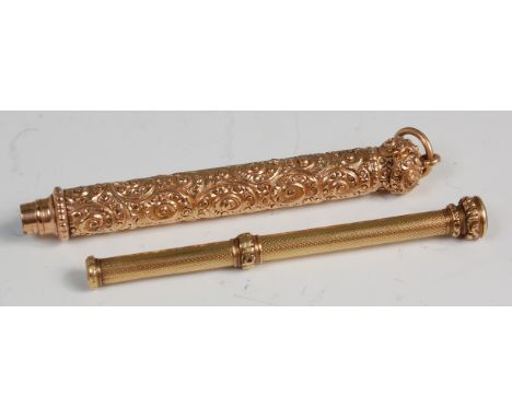 A Victorian gold propelling pencil by Samson Mordan & Co, having engine turned body and amethyst inset base, 8cm (closed); an