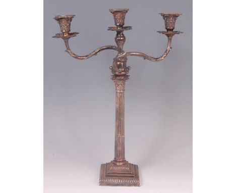 A late 19th century silver plated three light candelabrum, each light with detachable sconce, embossed capitals and gadrooned