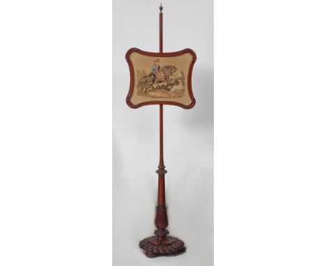 A mid-Victorian mahogany pole screen, having a needlepoint inset panel depicting an early fox hunting scene, with rise-and-fa