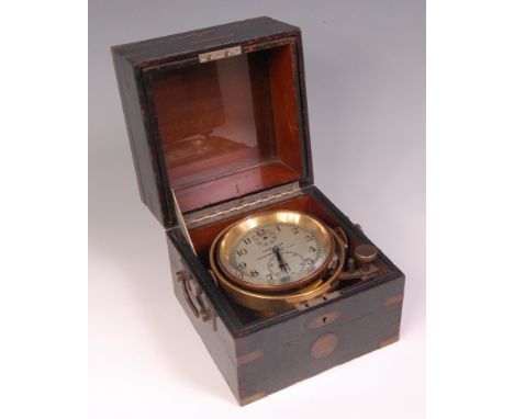 A Hamilton ships chronometer, model 22 Lancaster PA, housed in brass bound ebonised case, the gimbled clock with signed silve