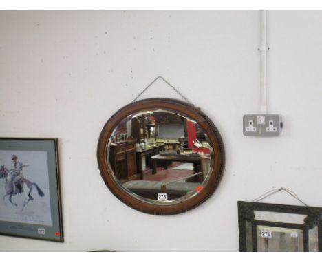 Oval oak framed mirror