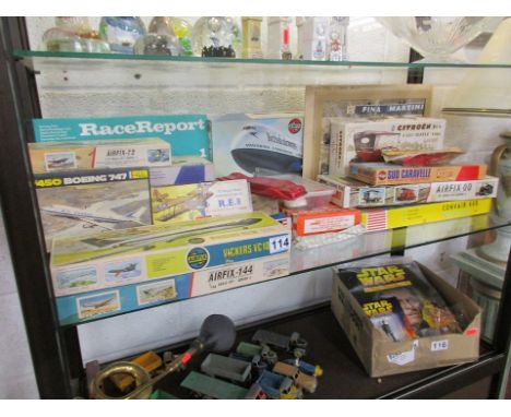Shelf of Airfix models etc