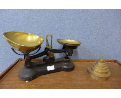 A set of vintage Libra kitchen scales and brass weights 