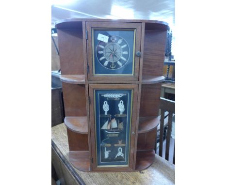 A nautical themed wall shelf/clock 