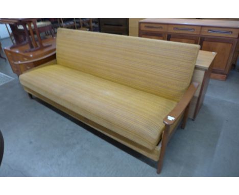 A Swedish teak and fabric upholstered sofa 