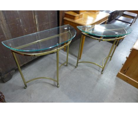 A pair of Italian style brass and glass topped demi-lune console tables 