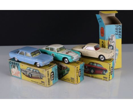 Three boxed Corgi diecast models to include 229 Chevrolet Corvair in pale blue, 239 Volkswagen 1500 Karmann Ghia in cream wit