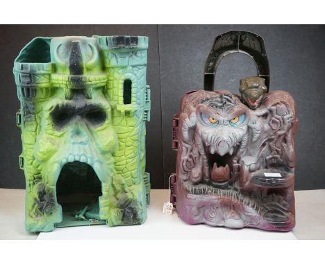 Two playworn Mattel He-Man Masters of the Universe Castle playsets to include Castle Greyskull and Snake Mountain, both showi
