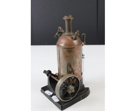 Early 20th C steam engine with boiler, marked Gamages to base of stand, rusting, approx 8" in height 