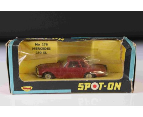 Boxed Triang Spot On 278 Mercedes 230 SL diecast model in metallic red, diecast gd but grubby, tatty box 