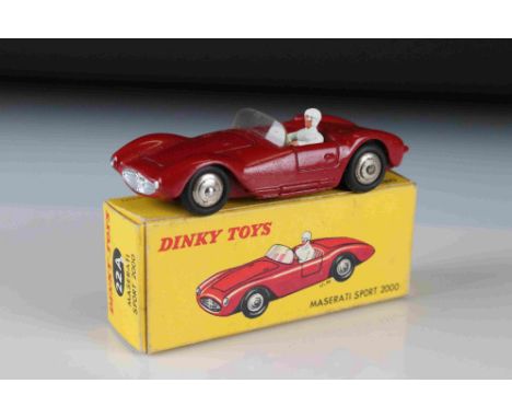 Boxed Dinky 22A Maserati Sport 2000 diecast model in burgundy, with driver, diecast vg with a couple of paint chips, gd box 