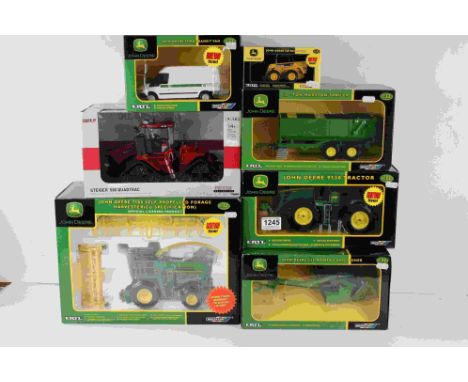 Six boxed Britains ERTL John Deere diecast farming models 42370 9530 Tractor, 40609 12 Ton Marston Trailer, 42118 Mower Condi