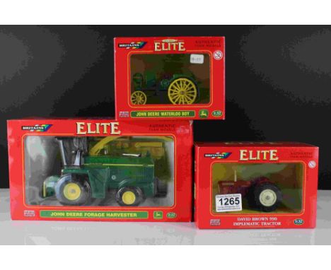 Three boxed 1:32 Britains Elite diecast models to include 04180 David Brown 990 Implematic Tractor, 40523 John DeereWaterloo 