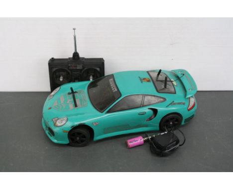 A CEN Racing CT4-S nitro Porsche 911 Turbo touring car, 4WD NX-15 2.5cc engine, double deck anodised alloy chassis, belt driv