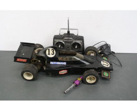 A Mardave 1/8 scale Nitro 2WD Rothmans JPS formula one radio control car c.1984 together with techniplus controller, glow plu