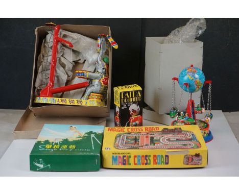 Collection of five tin plate toys, to include boxed Single Bar Exercise Gymnast, Panda Drummer &amp; Magic Cross Road, togeth