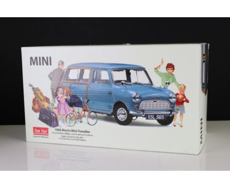 Boxed Sun Star 1;12 scale 1960 Morris Mini Traveller diecast model in pale blue, model in VG condition with certificate, box 