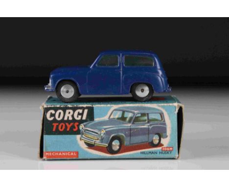 Boxed Corgi 206M Mechanical Hillman Husky in dark blue diecast model, silver cabs, diecast vg overall, gd box with Corgi pape