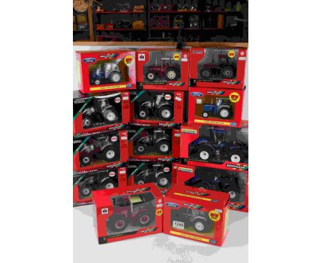 14 Boxed 1:32 Britains diecats tractor models to include 6 x 43215 Valtra T254V, 42628 New Holland T9.670, 42629 New Holland 