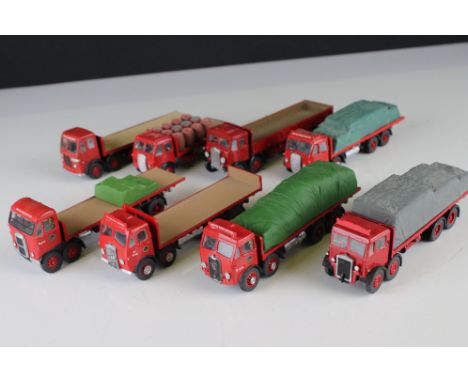 Eight kit built BRS HO scale flat bed trucks/lorries, all white metal/diecast 