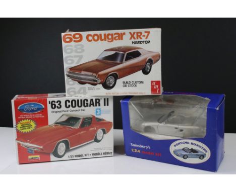 Two boxed 1:25 scale plastic model kits to include AMT 220269 Cougar XR-7 Hardtop and Lindberg '63 Cougar II, both factory se