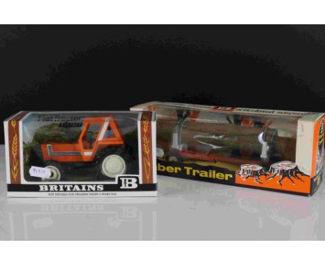 Two boxed Britain diecast &amp; plastic farming models to include 9528 Fiat Tractor and 9559Timber Trailer, models excellent,