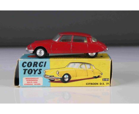 Boxed Corgi 210S Citroen DS19 diecast model in red, showing paint chips, fair-gd box 