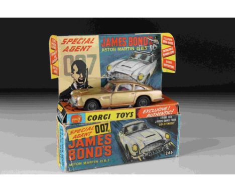 Boxed Corgi 261 James Bond 007 Aston Martin diecast model, wear to roof otherwise diecast vg, inner display stand gd, outer b