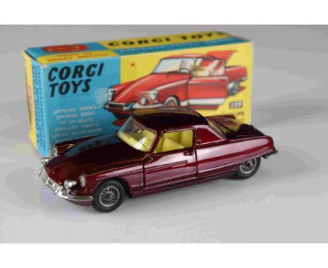 Boxed Corgi 259 Le Dandy Coupe Henry Chapron Body on Citroen DS Chassis diecast model in metallic maroon, yellow interior, di