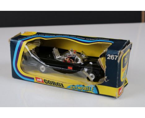 Boxed Corgi 267 Batmobile diecast model with Batman &amp; Robin figures, with instructions bag, instruction bag and 3 x missi