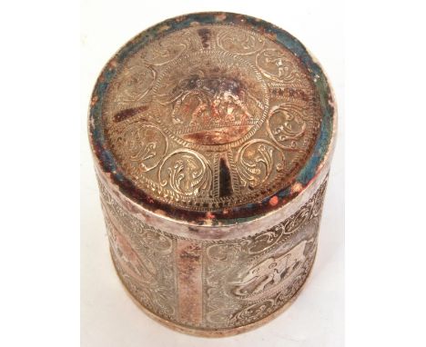 Indian white metal tea caddy with dome lid, repousse decorated the four sides decorated with elephants etc, 9.5cm high (unmar