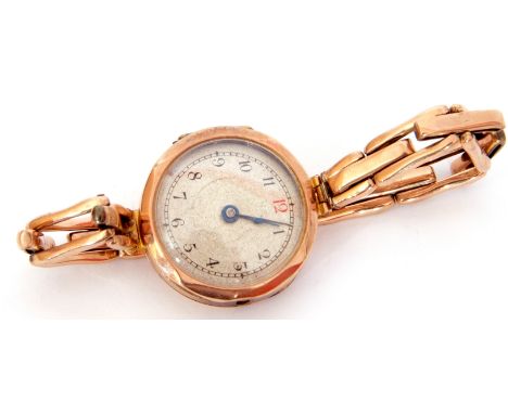 First/second quarter of 20th century ladies 9ct gold cased wrist watch with blued steel hands to a silvered dial with red and