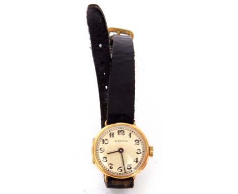 Ladies first quarter of 20th century import hallmarked 18ct gold cased wrist watch, black hands to a silvered dial with black