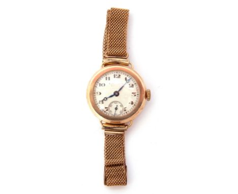 Ladies first quarter of 20th century import hallmarked 9ct gold cased wrist watch with blued steel hands to a silvered dial w