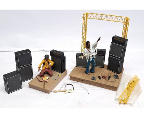 McFarlane Toys Jimi Hendrix loose action figures x2, to include Jimi Hendrix Aug.18, 1969 8:04am, and Jimi Hendrix 2 at Monte