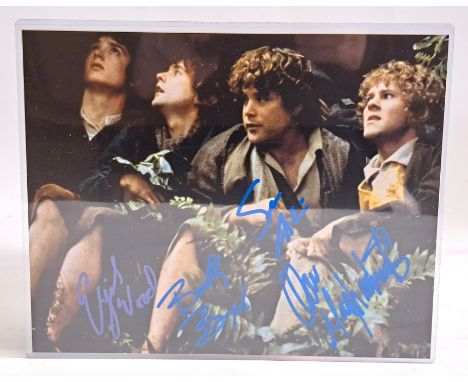 The Lord of the Rings Hobbits autographed photo, signed by Elijah Wood, Sean Astin, Dominic Monaghan, and Billy Boyd, with Ce