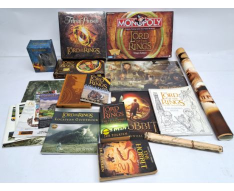 Assortment of Lord of the Rings books, location guides, board games in mixed lot. Condition varies Trivial Pursuit is sealed.