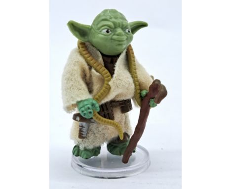 Kenner Star Wars vintage Yoda action figure (Green Snake and 'pac-man' eyes). Condition Good to Good PlusCane has minor sun d