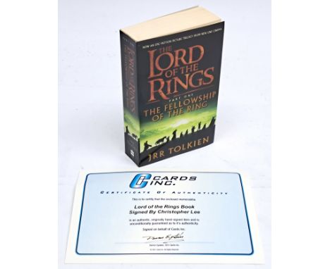 The Lord of the Rings Fellowship of the Ring book signed by Christopher Lee, with COA from Cards Inc. See photo.