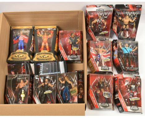 Mattel WWE action figures, comprising of Defining Moments, Network Spotlight and Elite Collection, figures include Vince McMa