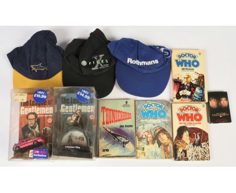 A mixed group to include Thunderbirds and Doctor Who paperback books, The League of Gentlemen DVDs, Tina Turner Goldeneye cas