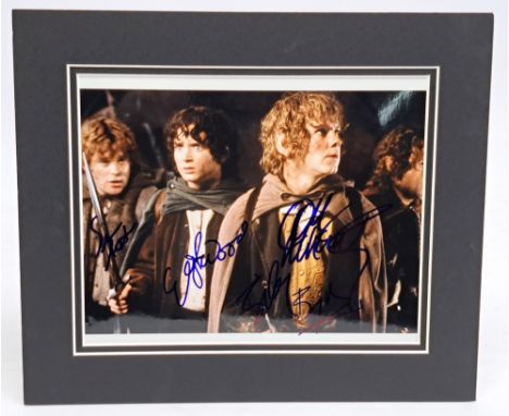 The Lord of the Rings The Hobbits autographed mounted photo, signed by Elijah Wood, Sean Astin, Billy Boyd, and Dominic Monag