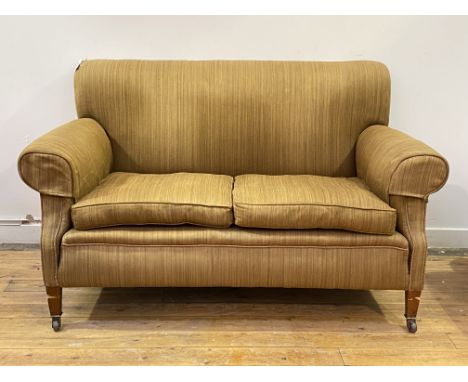 Whytock and Reid, an Edwardian mahogany framed two seat sofa, upholstered, with squab cushions, raised on square tapered supp