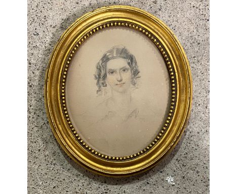 English School, c. 1830, a portrait of Charlotte Naomi Fitzmaurice, chalk over pencil, unsigned, in an oval giltwood frame. 1